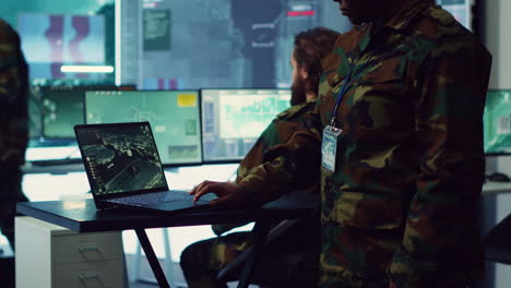 navy operations specialist examines ships along the coast line