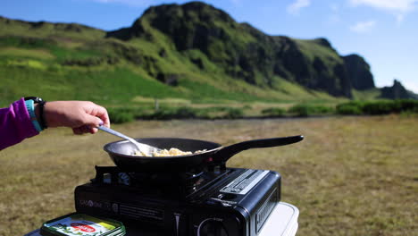 cooking an outdoor breakfast meal at the vik