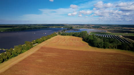 panorama of a large area of solar farm with serene nature