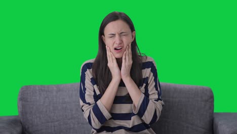 Sick-Indian-girl-suffering-from-tooth-pain-Green-screen