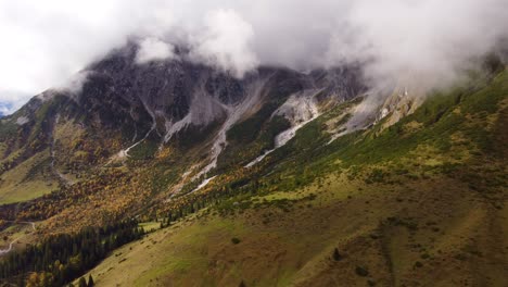 epic aerial shot of austrian alps in autumn fall, hochkonig mountains, dolly in