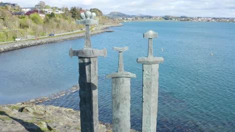sverd i fjell swords monument. stavanger, norway, drone aerial view from close up to wide