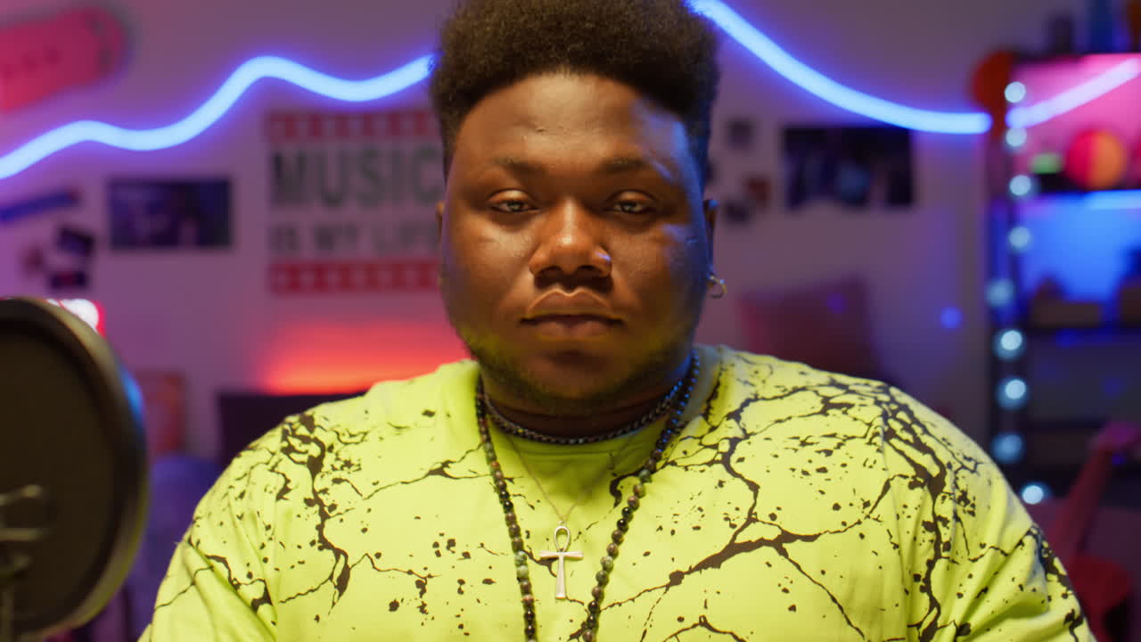 African American Musician Posing in Recording Studio