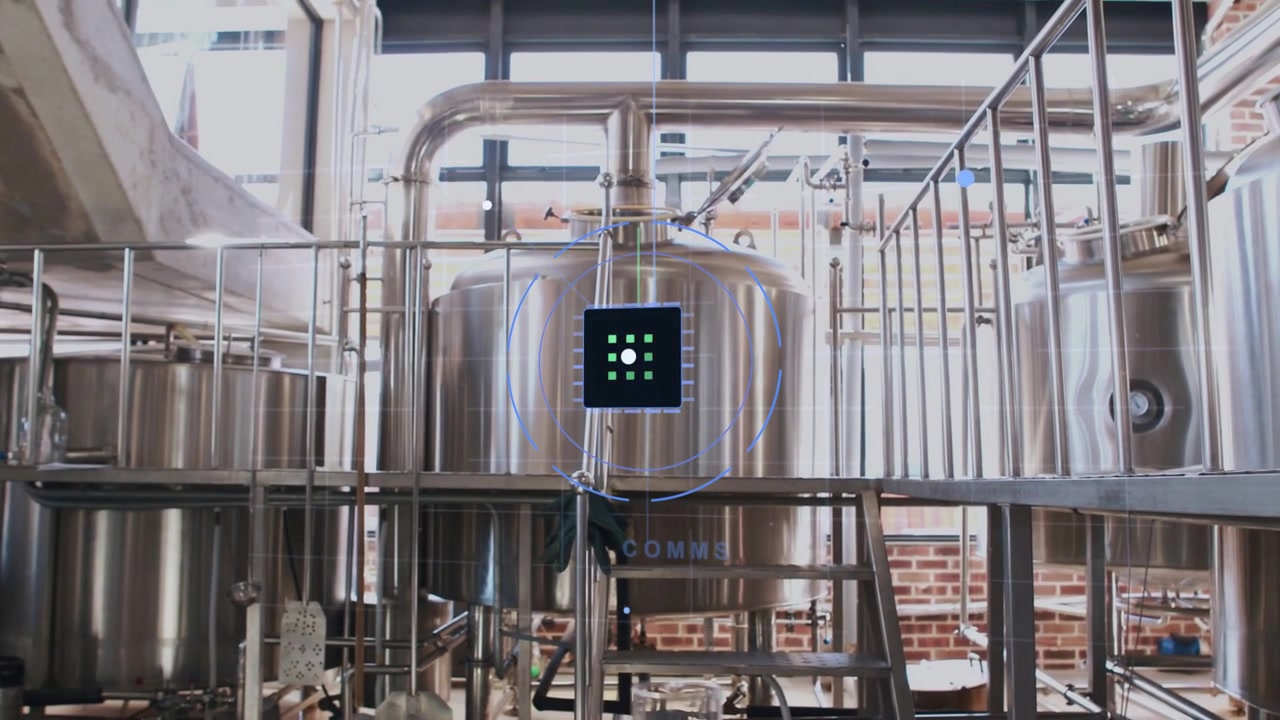 Large stainless tank with UI appearing, radiating arcs while camera pushing highlighting status