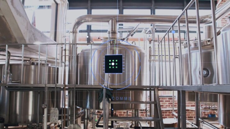 Large stainless tank with UI appearing, radiating arcs while camera pushing highlighting status