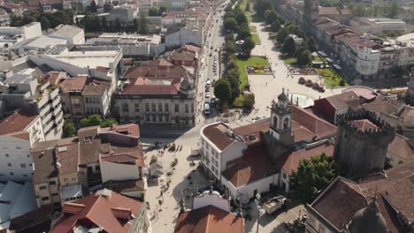 Aerial-top-down-circling-over-Braga-old-city-center,-Portugal