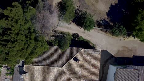 aerial overhead shot of old houses in a rural town of the south of spain