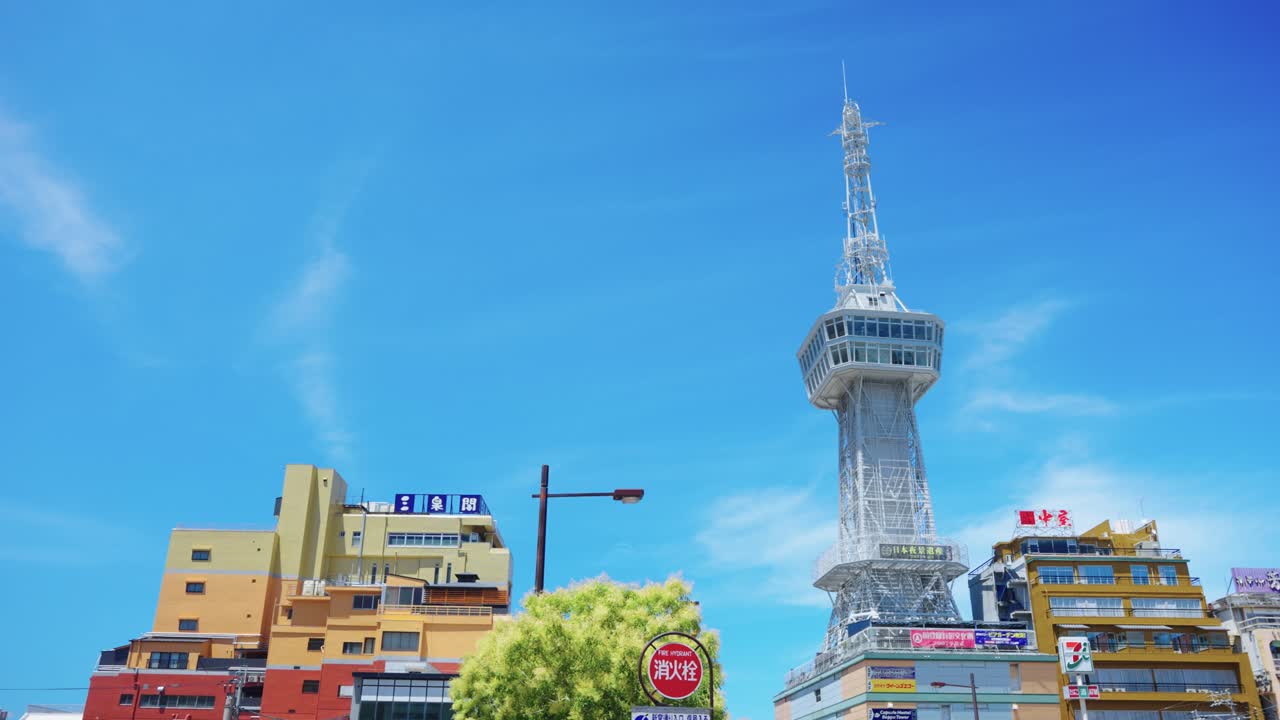 Summer in Beppu, City Establishing Shot with Tower in Background, Oita Japan