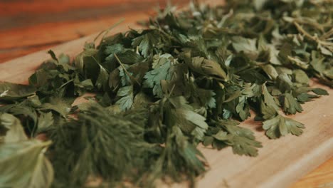 fresh coriander parsley leaves stocked on cutting board