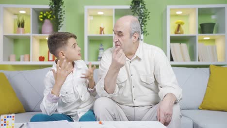 Grandfather-congratulating-the-boy-who-came-up-with-an-idea.