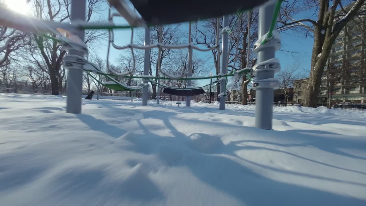 Fpv shot various obstacles in the playground during winter in Montreal, Canada