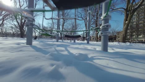 fpv shot various obstacles in the playground during winter in montreal, canada