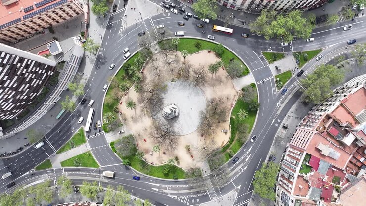 Scenic Roundabout At Barcelona Spain. Famous Roundabout. Downtown Cityscape. Top View Crossing. Scenic Roundabout In Spain. Barcelona Street Scene.