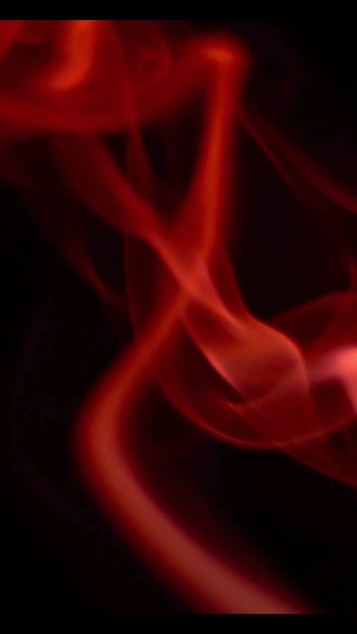 Motivi di fumo vibranti rossi e arancioni su sfondo nero