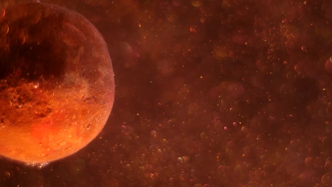 Cropped big planet rotating around its axis, sun shining its side, stars glittering, space dust is raising up.