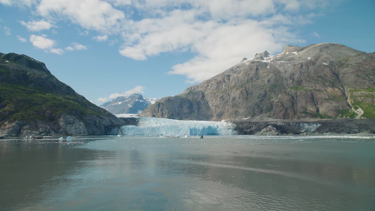 Margerie Glacier surrounded by mountains in Glacier Bay, Alaska. For projects requiring longer clips in higher resolution, visit StockPlates.