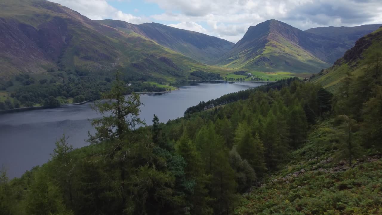 Cinematic aerial immersing in incredible natural landscape in Buttermere, Lake District, UK