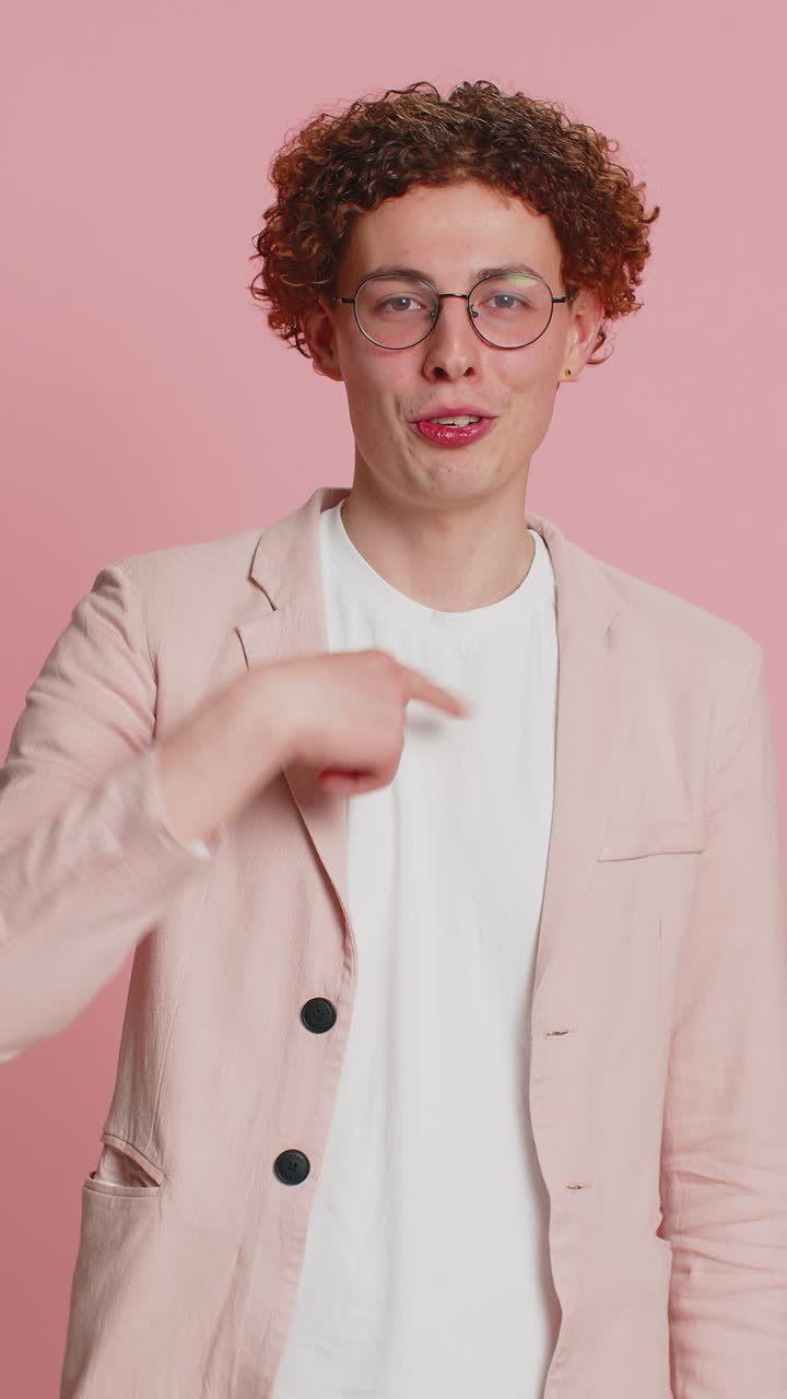 Smiling happy man pointing forward to camera choosing lucky victory winner indicating promotion