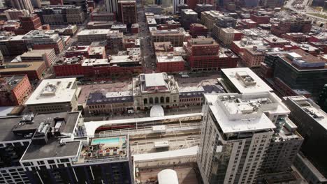 union station denver, colorado surrounded by downtown cityscape buildings