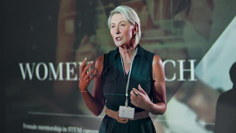 woman speaker at a women in tech conference