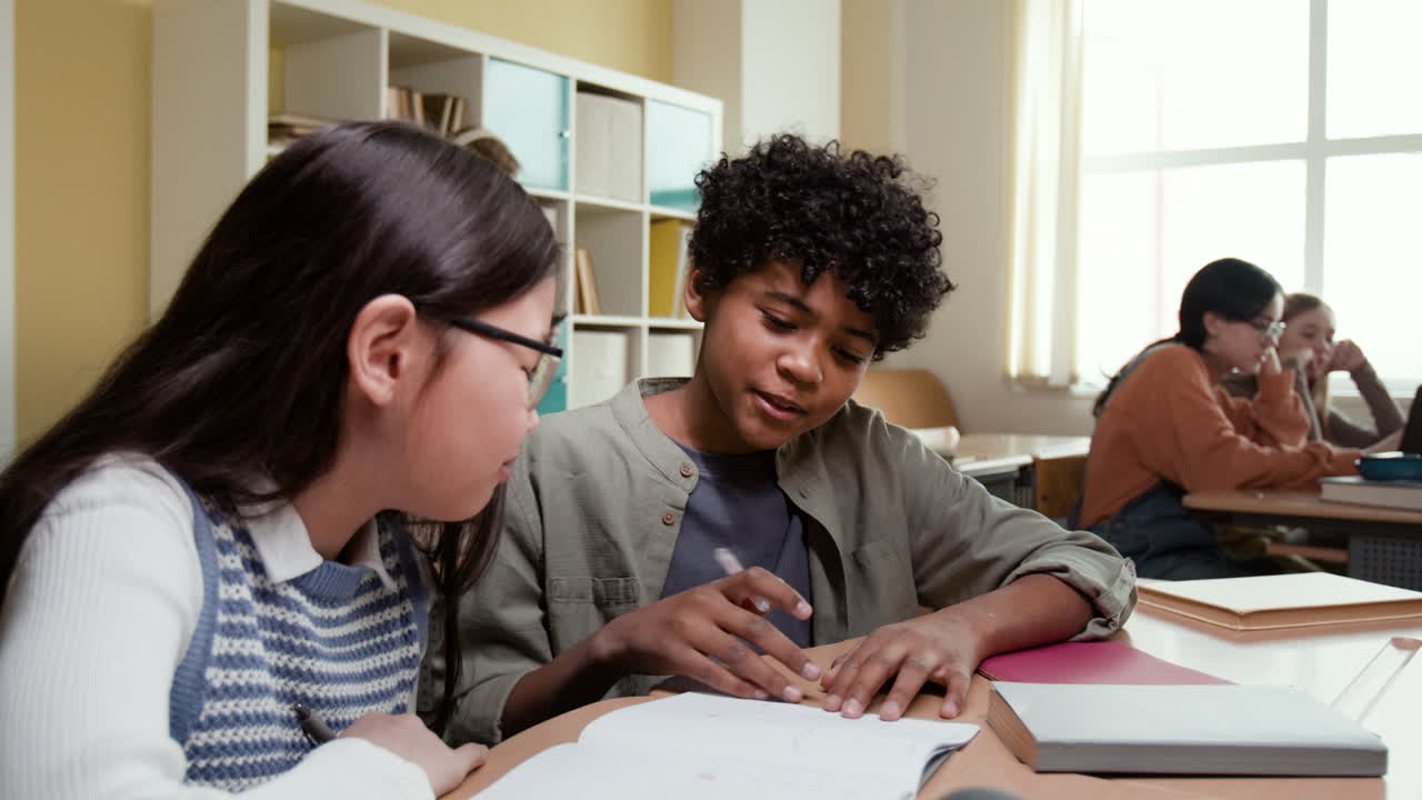 Students collaborating on schoolwork in a classroom