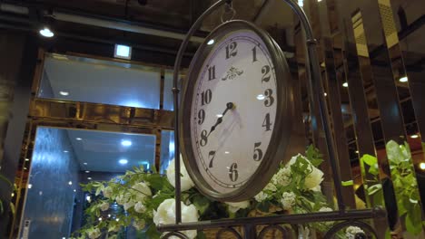 parallax around fancy clock in lobby of modern building, suncheon, south korea