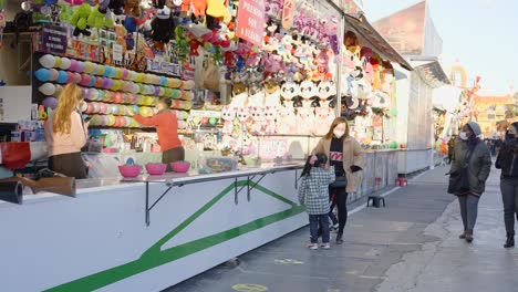 carnival games booth with family