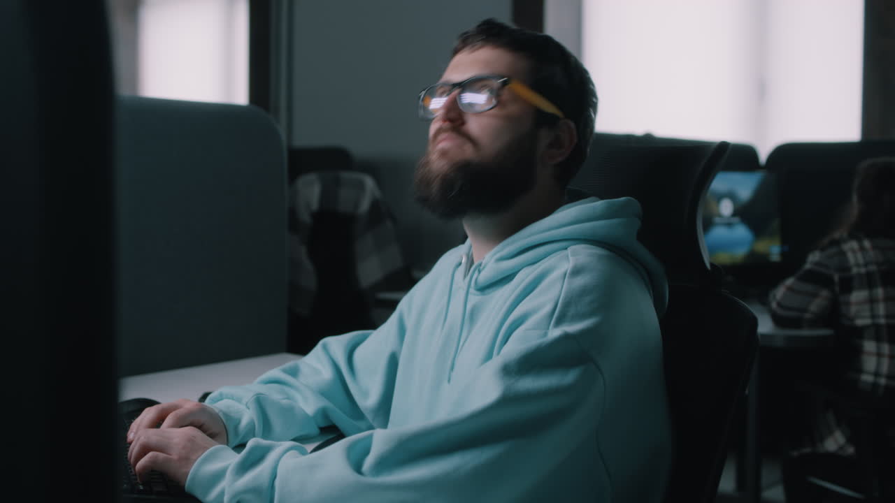 Man Working on Computer in Office