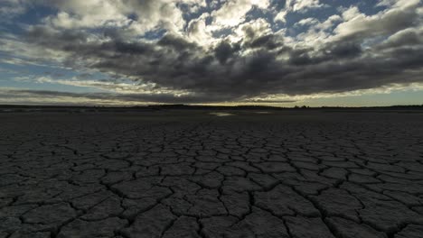 dried surface of salty lagoon at sunset