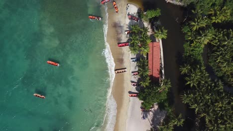 birdseye view directly above cepe beach bay - aragua state, venezuela, rocket shot