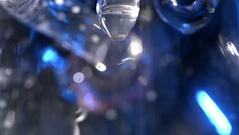 abstract close-up of water droplets and glass