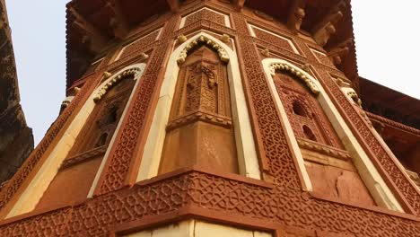 corner column of jahangir palace in agra, india with creative and artistic carvings on the walls