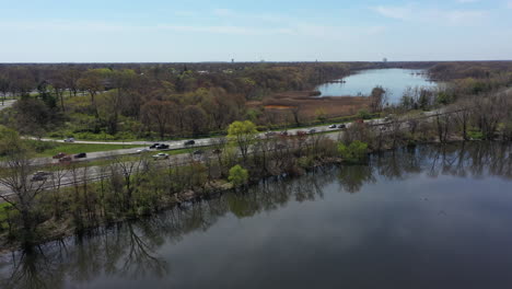 An-aerial-view-of-some-reflective-lakes-during-the-day