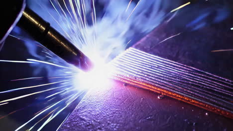 close-up of welding sparks on metal