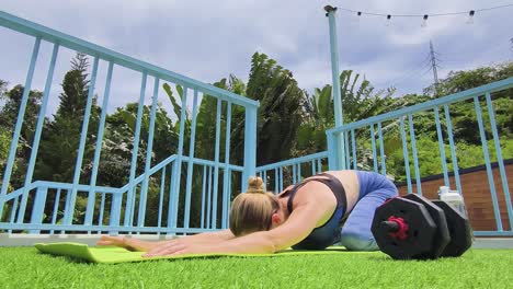 woman doing outdoor yoga and exercise