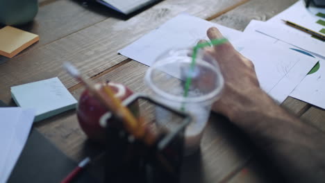 businessman hand signing cooperation agreement at negotiation table