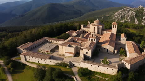 historic monastery complex nestled in a mountain valley