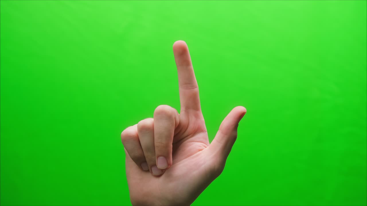 초록색 바탕에 손의 몸짓을 클로즈업, 지표손가락을 위로 올려놓은 몸짓, 지표 손가락, 스튜디오에서 몸짓을 촬영하는