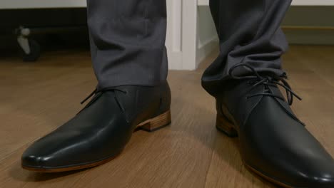 male wearing formal dress shoes