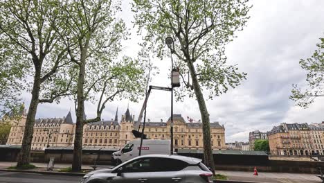 traffic and pedestrians by historic european architecture