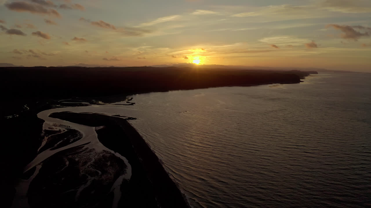 Aerial View of Sunset over Ocean Coast
