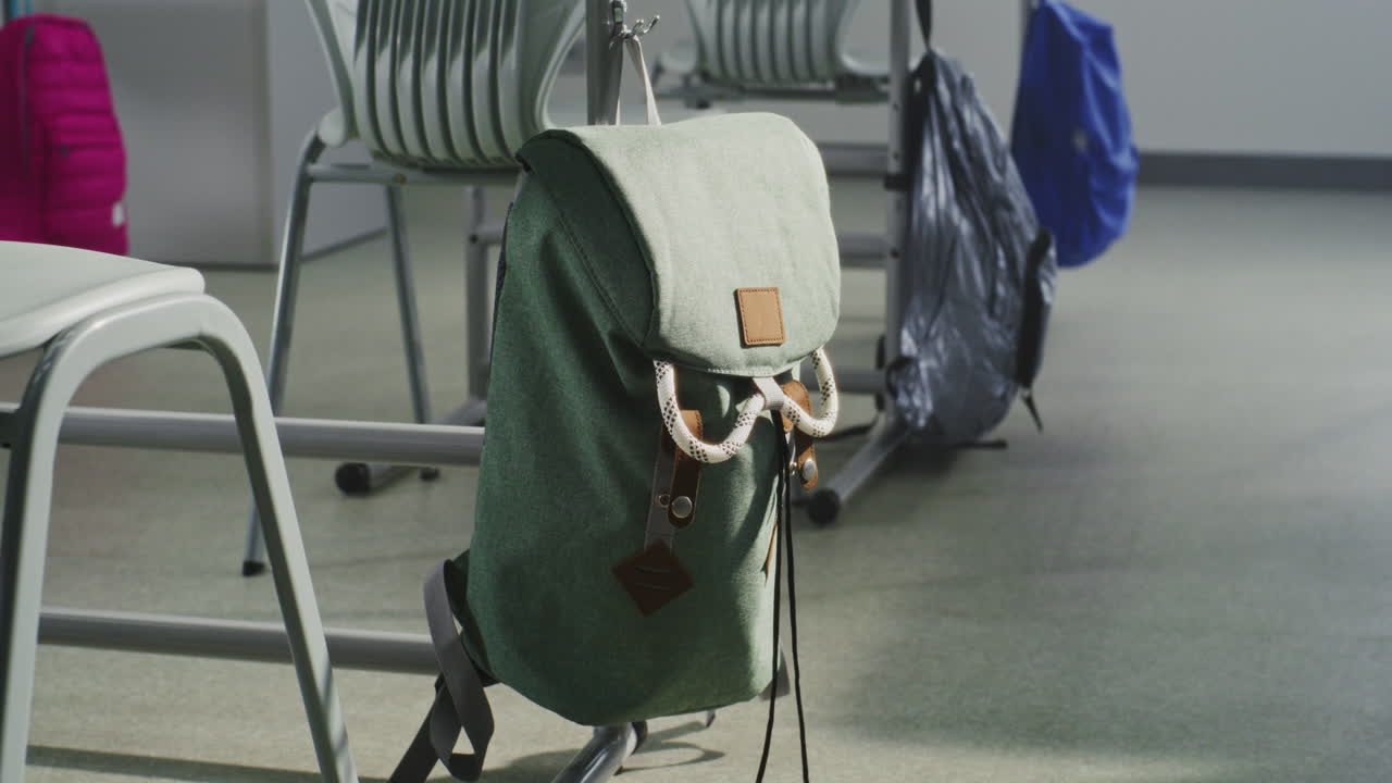 Close Up Student Running with Backpack Smiling Near College Building