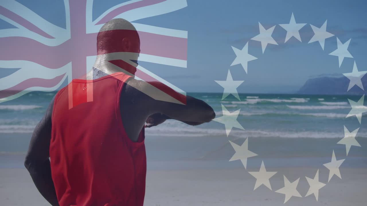 Man in red tank top on beach with flag overlay animation
