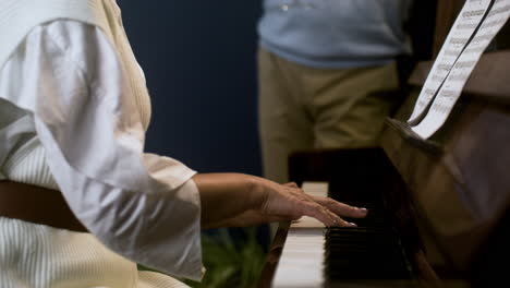 couple playing music at home