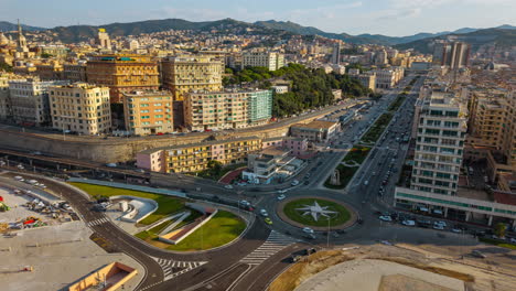 hyperlapse genoa, italy, fast traffic at star-shaped roundabout, cars moving through city streets with scenic skyline and buildings