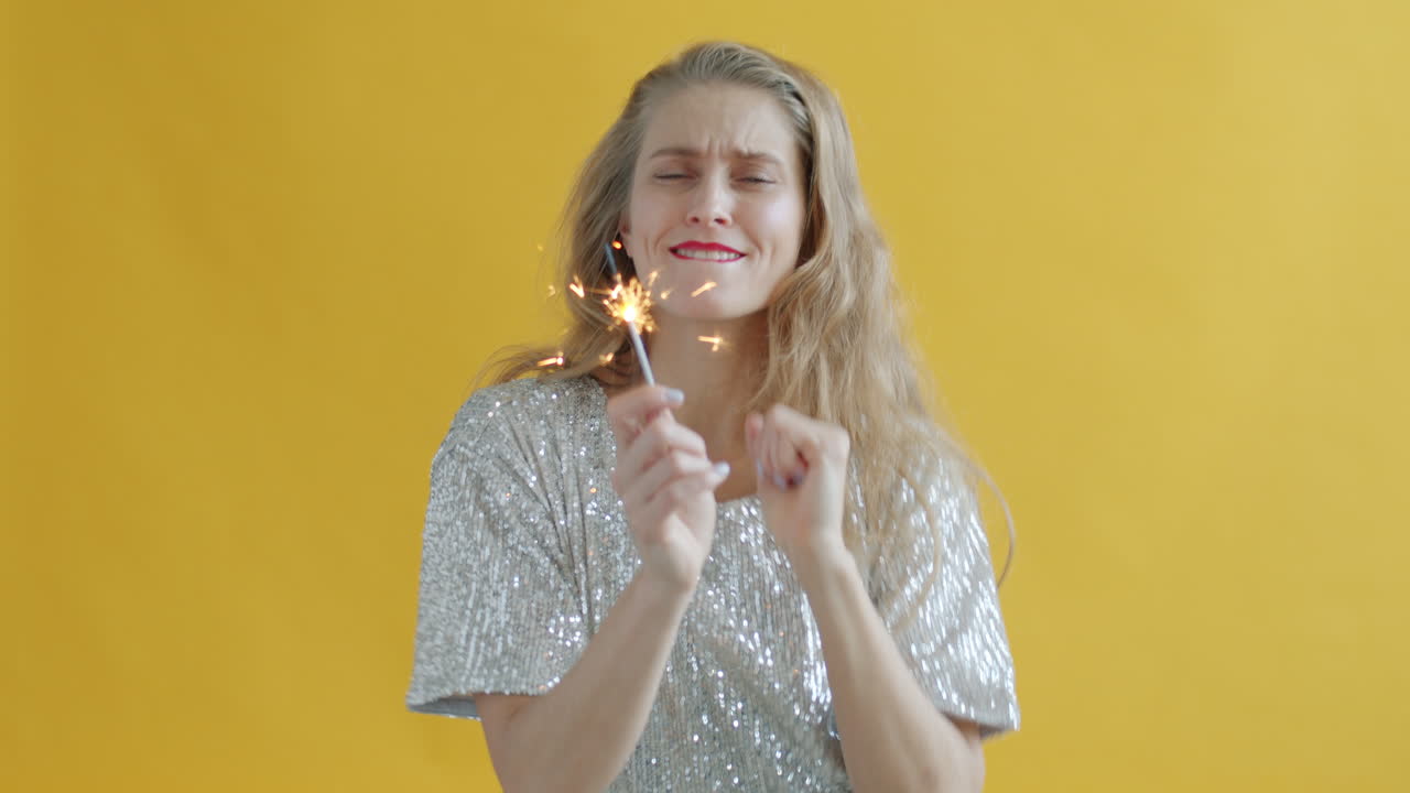 Woman Celebrating with Sparkler