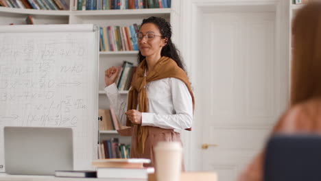 teacher presenting mathematics