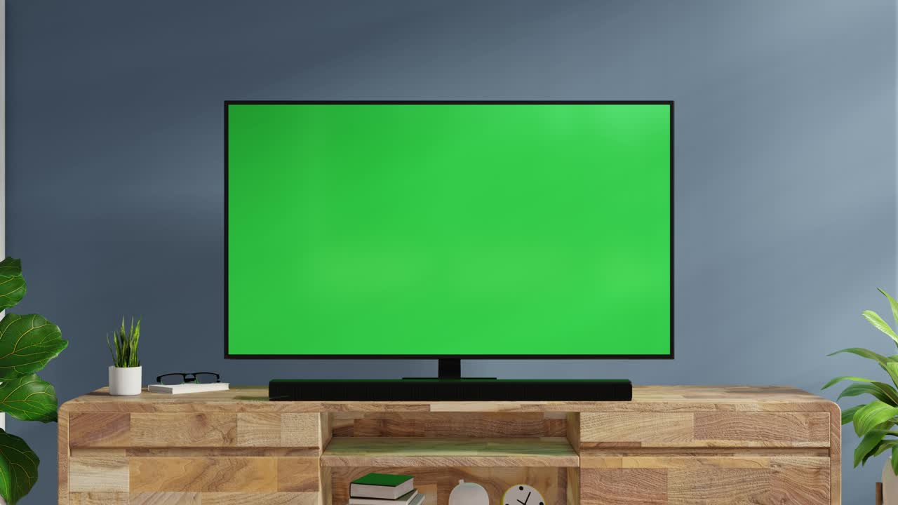 TV on cabinet in in modern living room with armchair and plant on dark marble wall background.