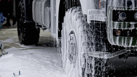 heavy truck washing with soap foam