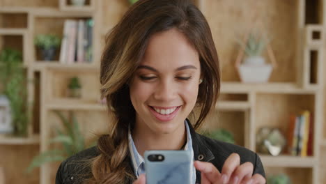 portrait of young woman using smartphone enjoying texting browsing online social media messages smiling happy mobile phone connection